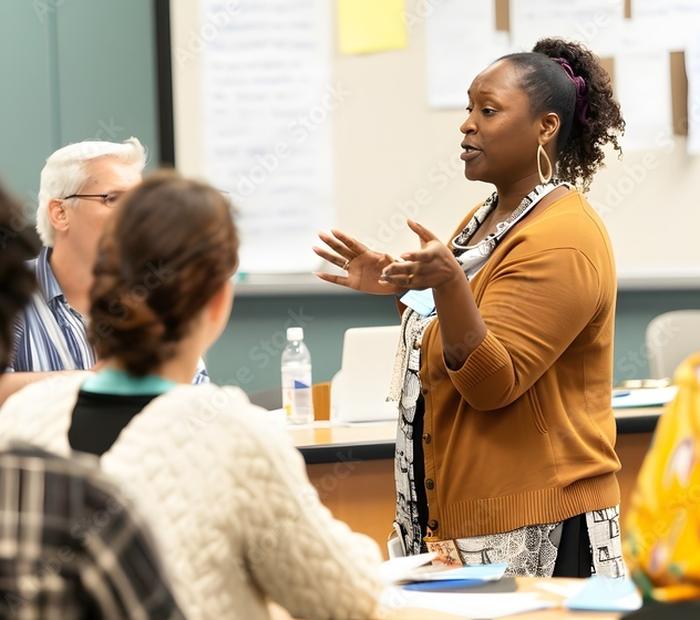 A leader guiding a group discussion